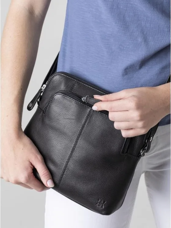 Raven Leather Cross Body Bag in Black